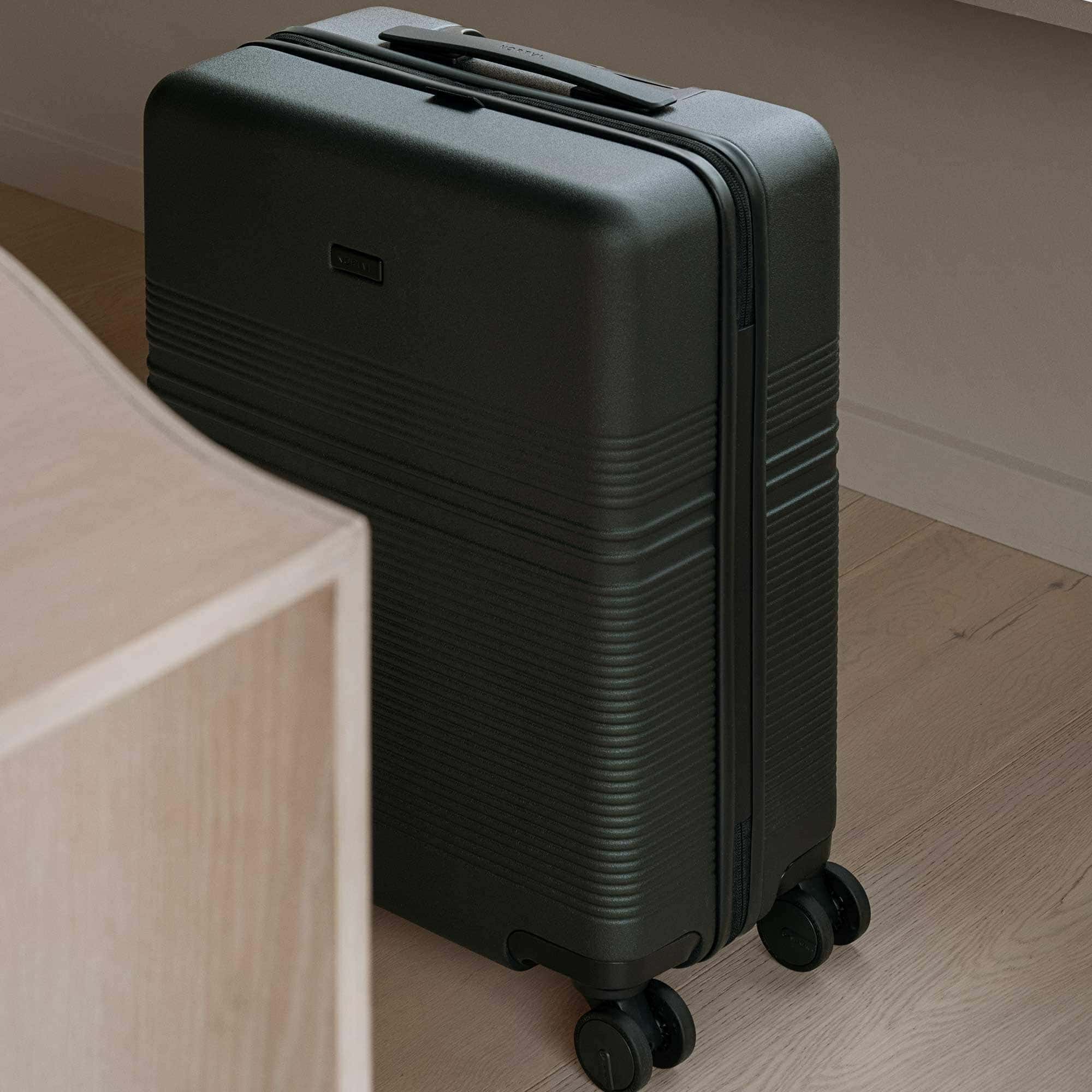 Essential Cabin Suitcase | Dark Green | Sustainable & Unique
